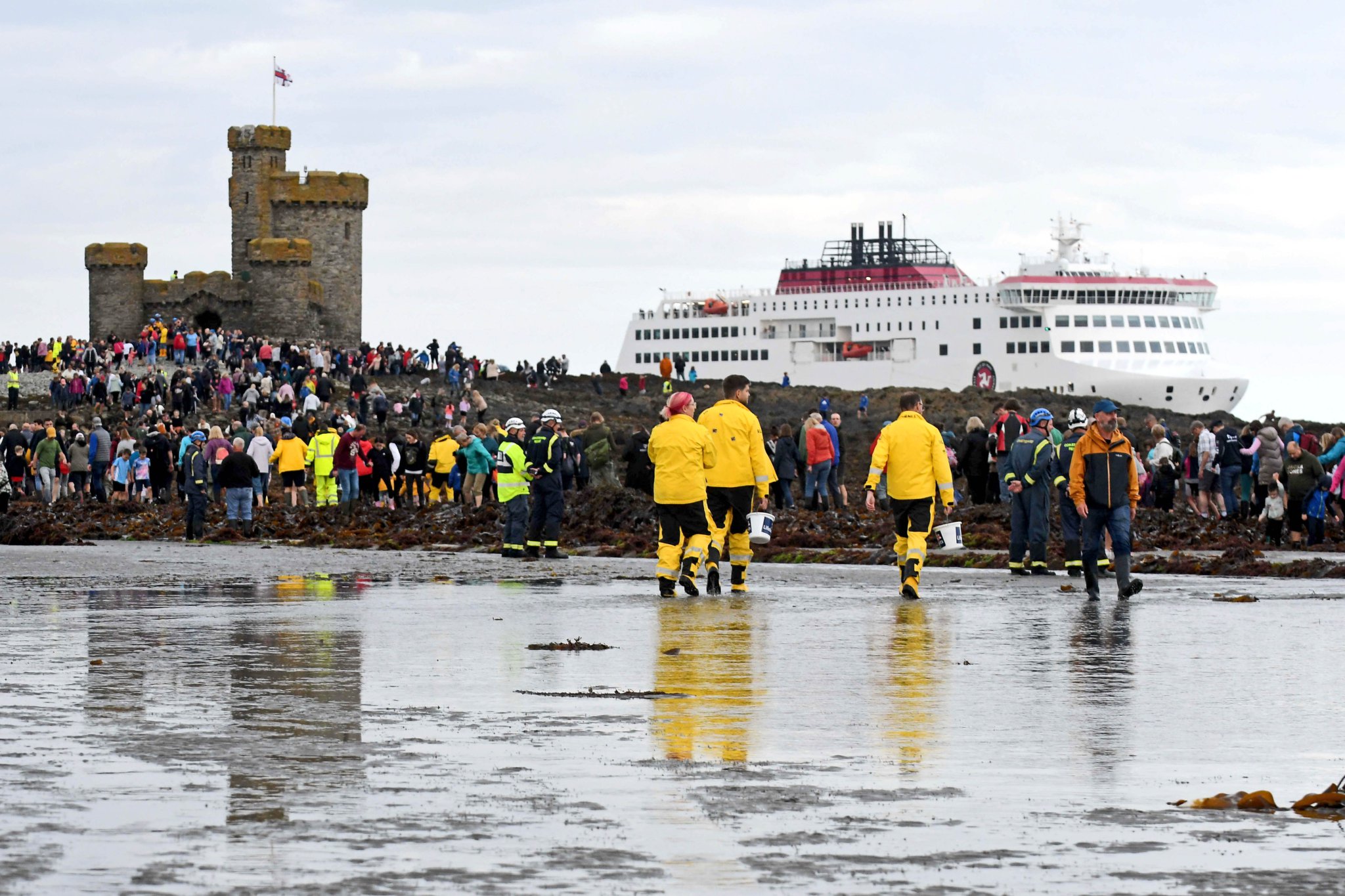 Thousands of people take part in a guided walk to the Tower of Refuge - Steam Packet vessel Manxman arrives into Douglas