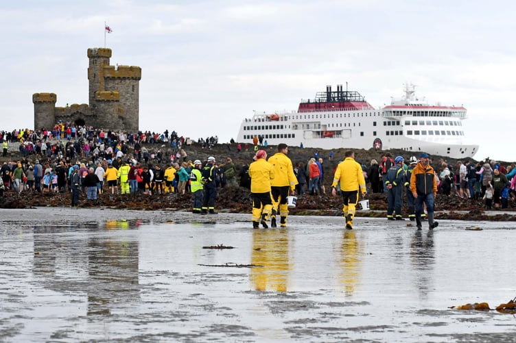 Thousands of people take part in a guided walk to the Tower of Refuge - Steam Packet vessel Manxman arrives into Douglas