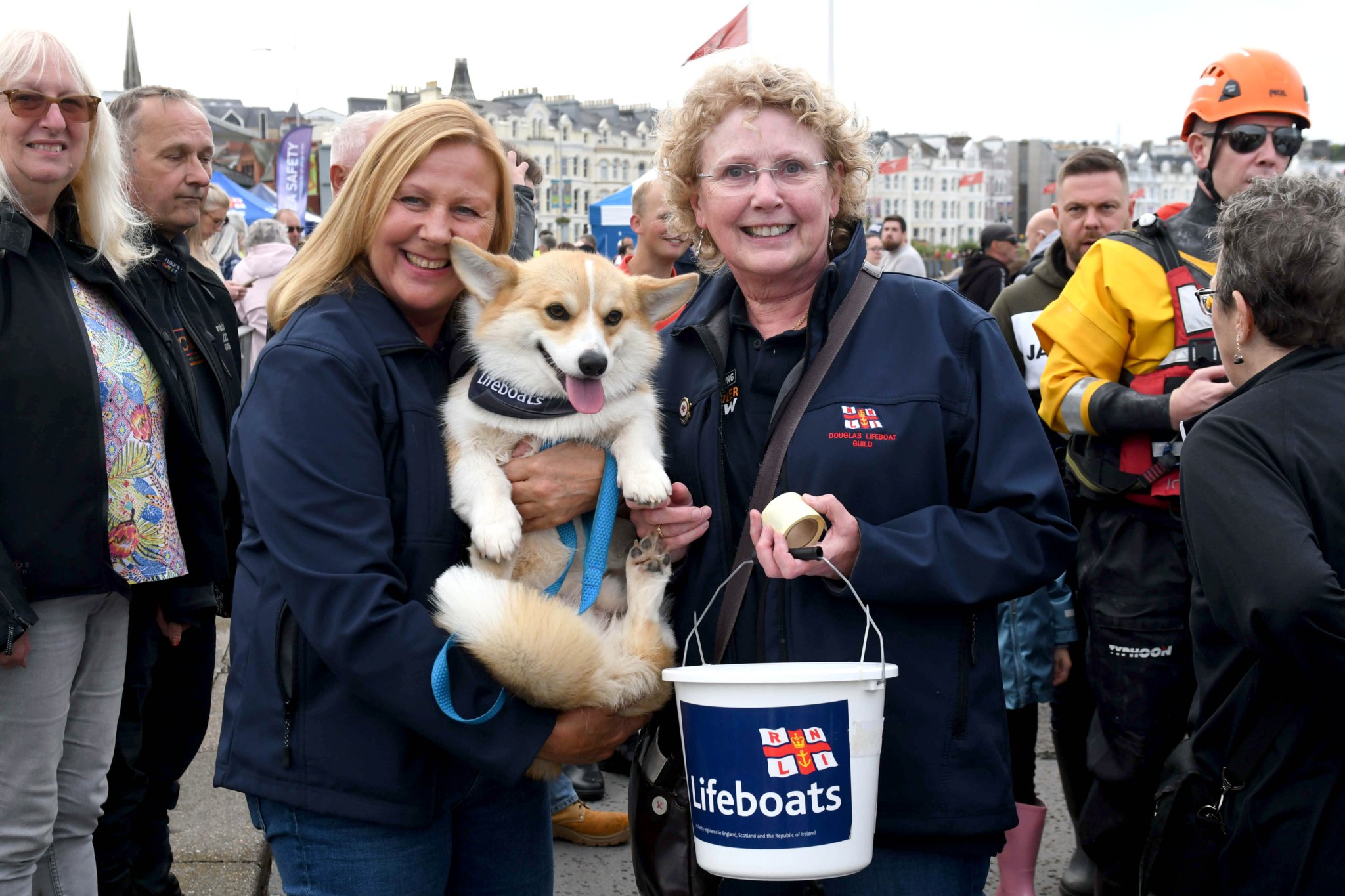 Thousands of people take part in a guided walk to the Tower of Refuge - pictured is Nicola Foden and Barbara Joughin, both members of the Douglas lifeboat Ladies’ Guild, with Teddy the dog