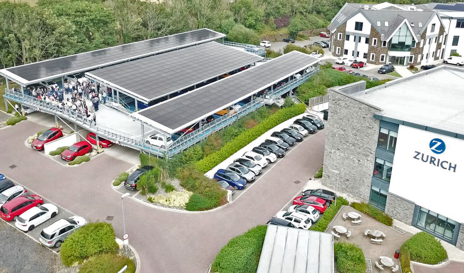 An aerial shot showing Zurich House and the solar panels on the roof of the office’s car park