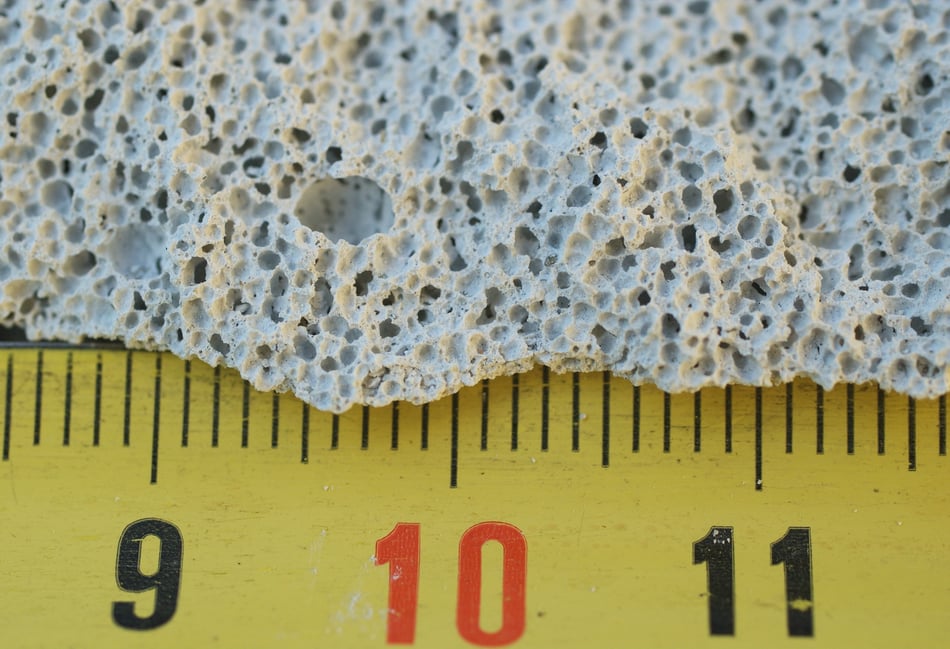 <p>Detail of air bubbles in aerated autoclaved concrete RAAC, which has been found to be prone to unexpected collapse</p>