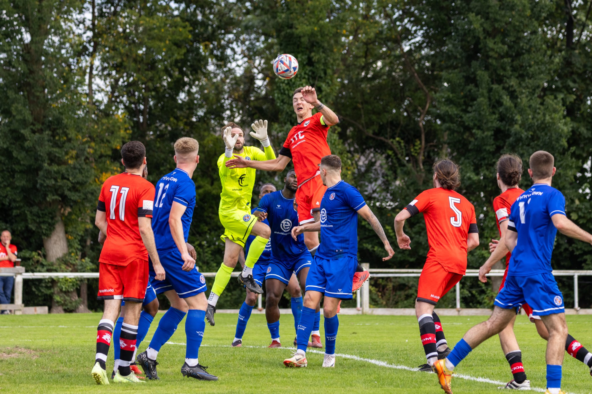 Ravens captain Sean Doyle rises highest to win a header against the Wythenshawe goalkeeper (Photo: Gary Weightman)