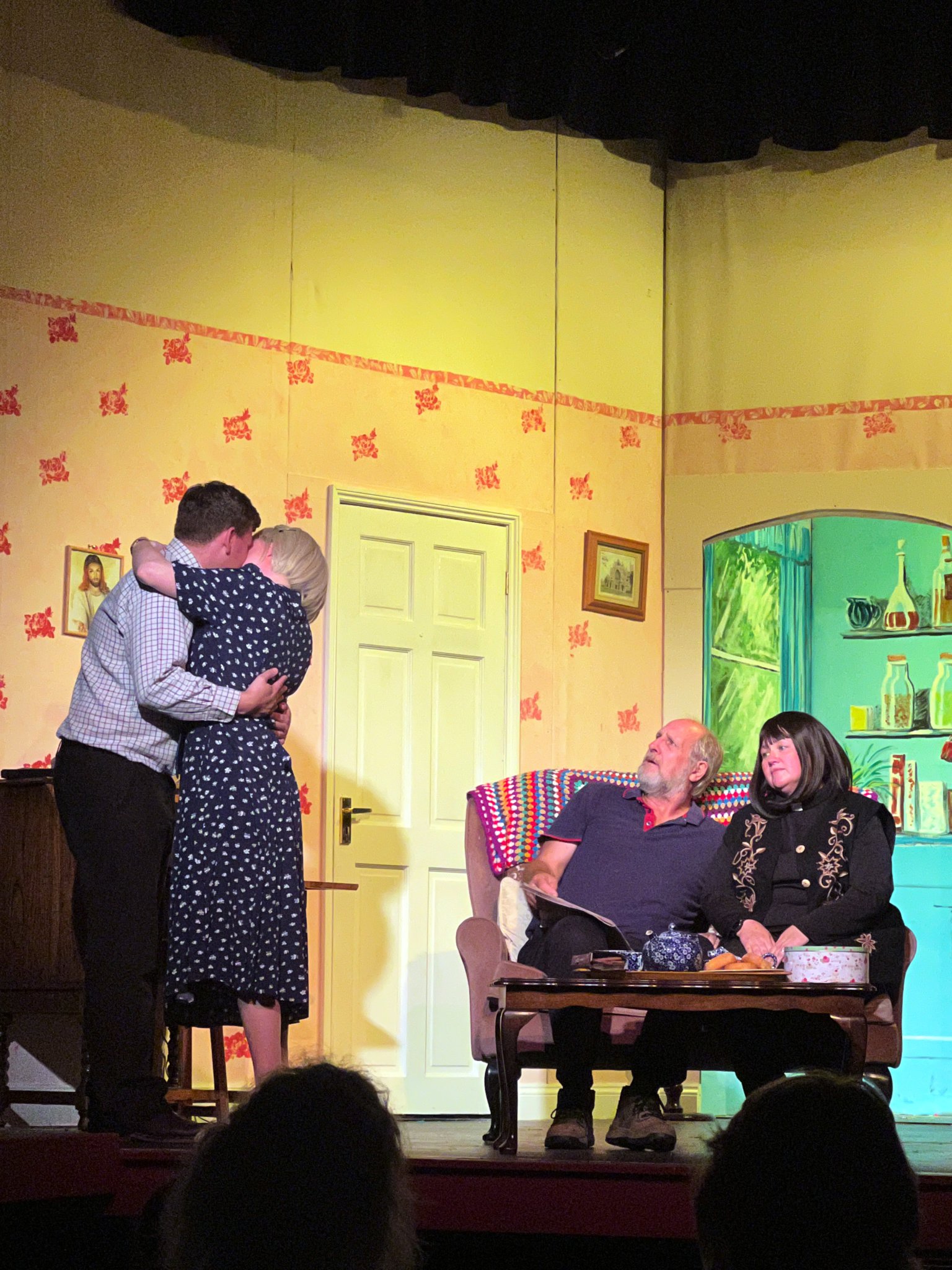 Hugo Horton played by Matt Long kissing his beloved Alice next to the vicar and Jim Trott played by Nick Cleaver