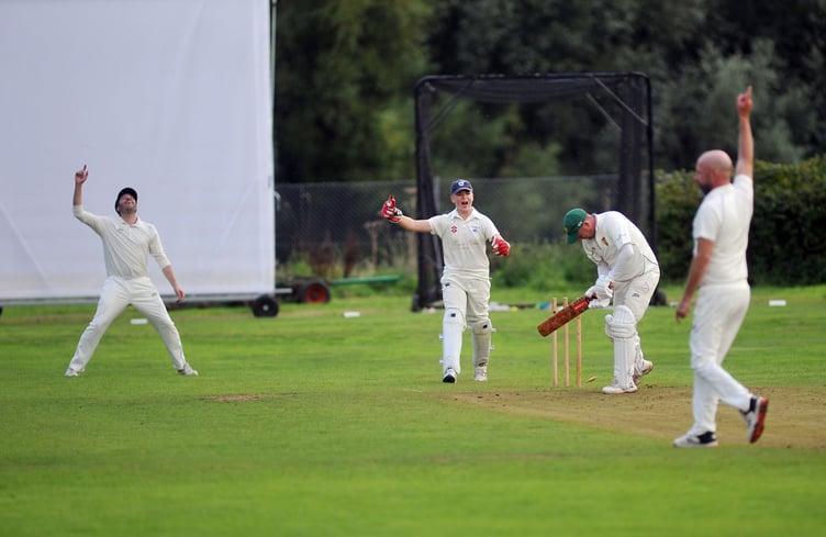 Kenn versus Hatherleigh. Hatherleigh's David Thayre is bowled by James Mason