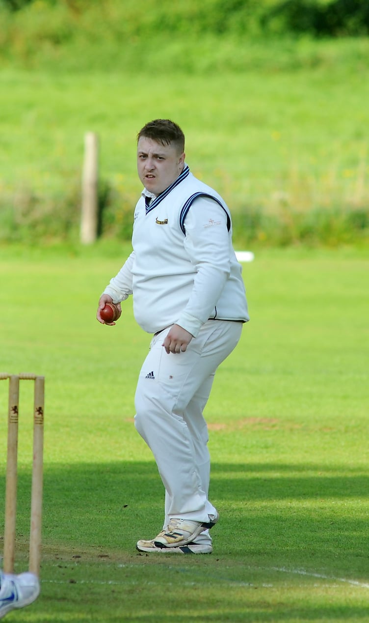 Devon Cricket League League D Division West. Kenn versus Hatherleigh. Kenn's James Gosling who was responsible for bowling and catching Hatherleigh's Greg Solkin and skipper Daniel Forrester