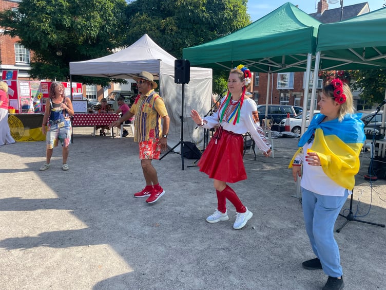 Avtar Indian Dance South West, second left, ran dancing sessions in the Town Square. AQ 6481