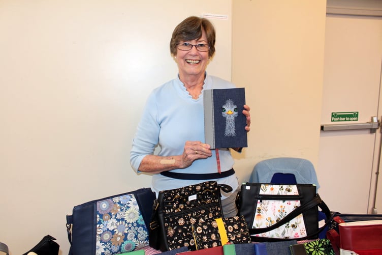 Jeanette Mitchell of Morchard Bishop makes a host of different bags and wallets, lots with embroidered covers. SR 8828