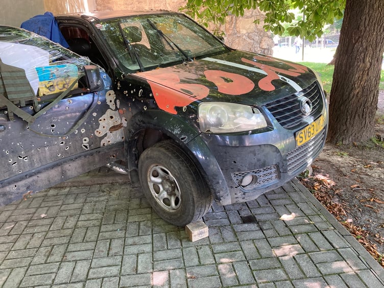 A donated vehicle after being used on on the front line