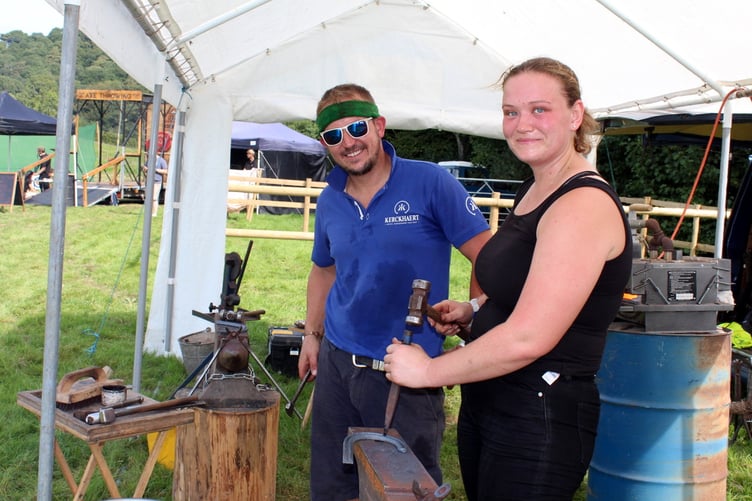 Farrier Stuart Taylor from Tedburn and his apprentice, Liv Roberts from Plymouth. SR 8887