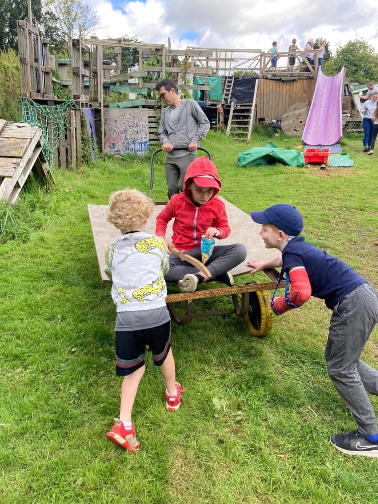 Andres Centellas with sons, Gael and Liam, and nephew, Stanley Quaye during an Isle of Play session