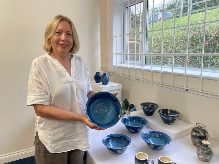 Mary Bond of Upexe, as a hobby, creates thrown earthenware items which are decorated with colour slips. AQ 6367