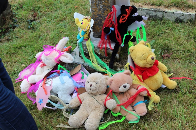 All safely landed, the teddy bears after their zip wire descent. SR 9094