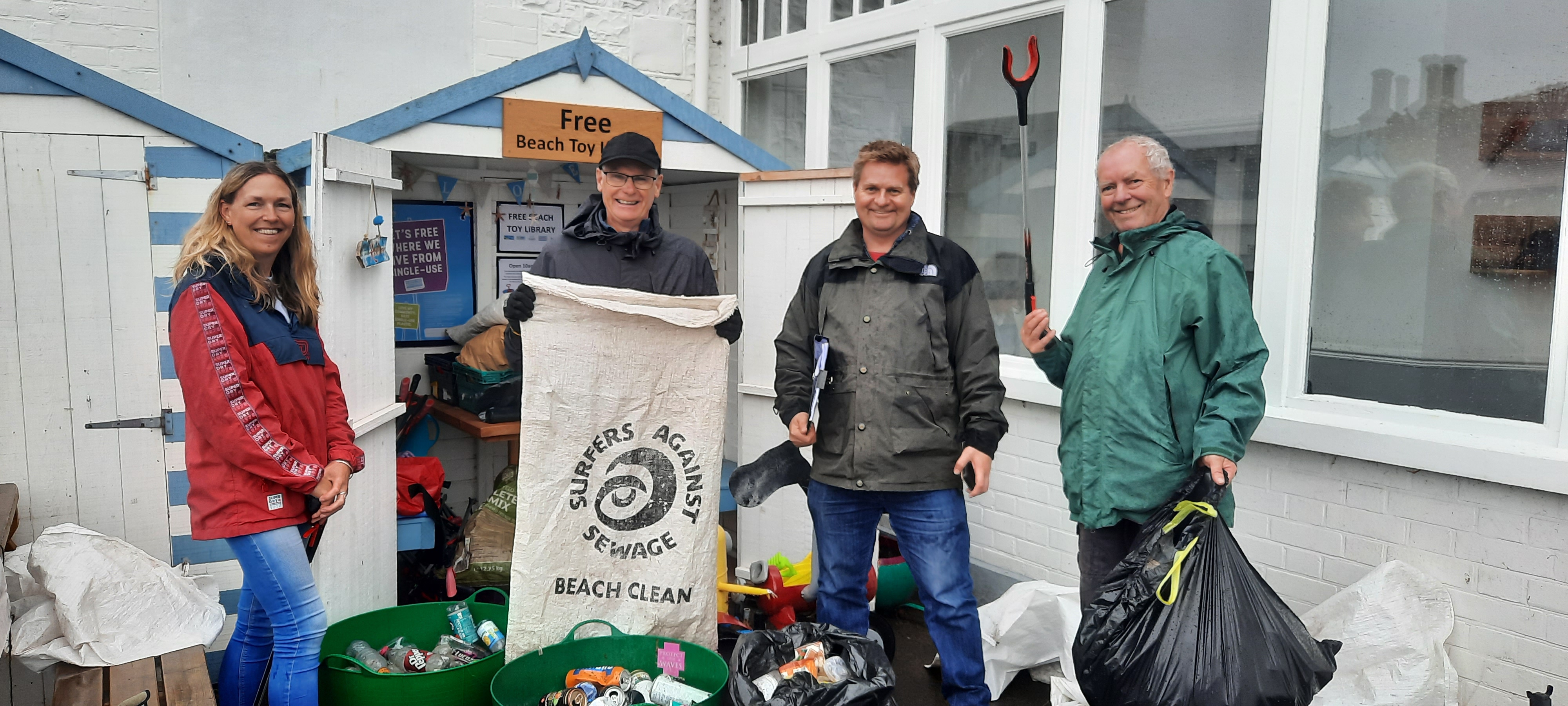 Plastic Free Communities volunteers help clean up beaches along