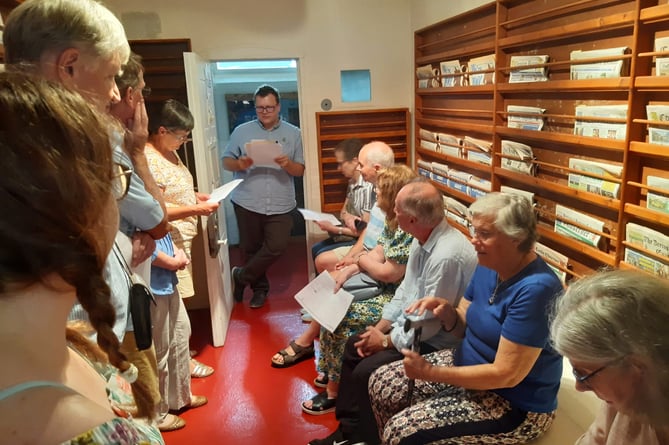 Daniel Gee, of the Herald Digital Archive Project, led tours of the Old Court House in Union Road – pictured speaking to guests in the last remaining cell of Farnham’s second police station