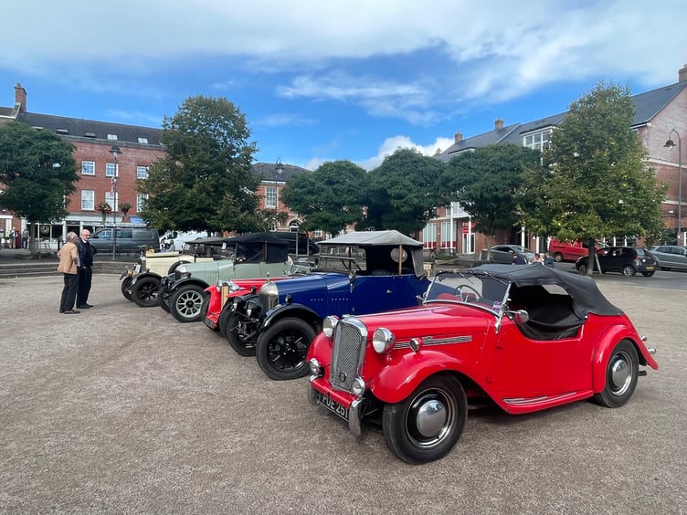The vintage cars in the Town Square. AQ 7594
