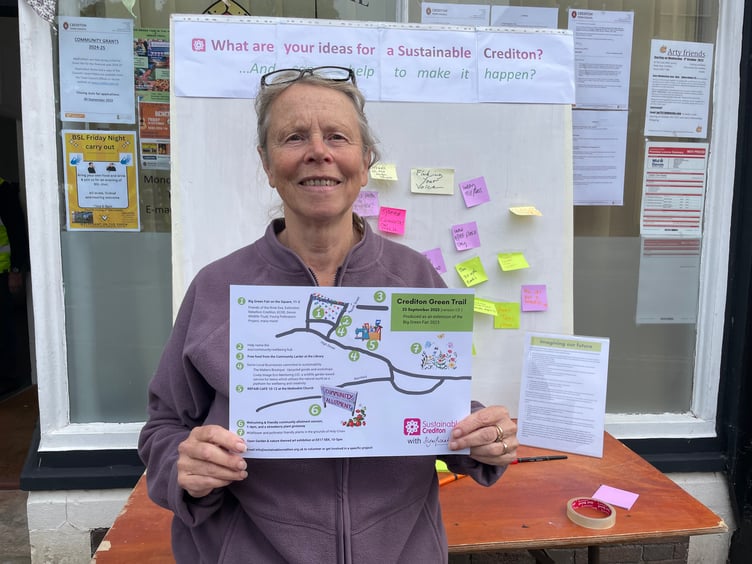 Christine Gregory with a copy of the Crediton Green Trail. AQ 7770