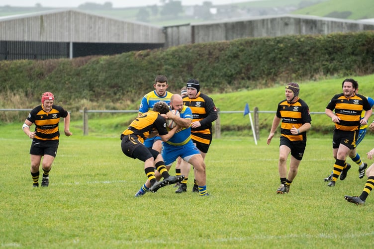 Ceri Davies powers through a tackle