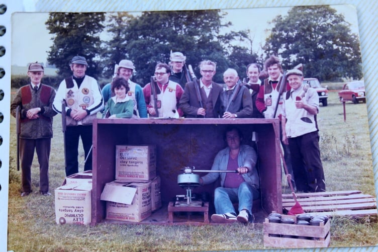 An early photo of members with Phil Wonnacott sat in the trap house setting off the clays. SR 9001