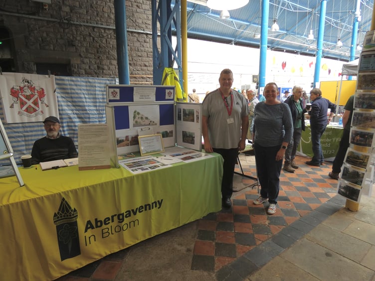 Cllr James George and Sandra Rosser at the Abergavenny Bloom stand.