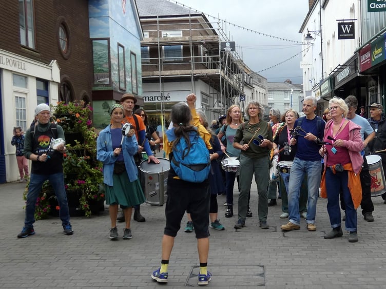 Samba Band made their way through the streets in a vibrant display.