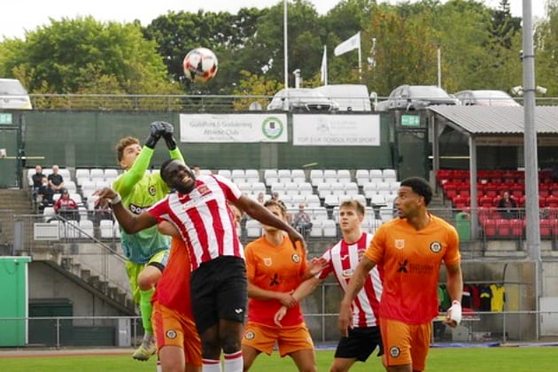 Alton goalkeeper Lewis Mees punches the ball clear during his side’s 3-0 win at Guildford City