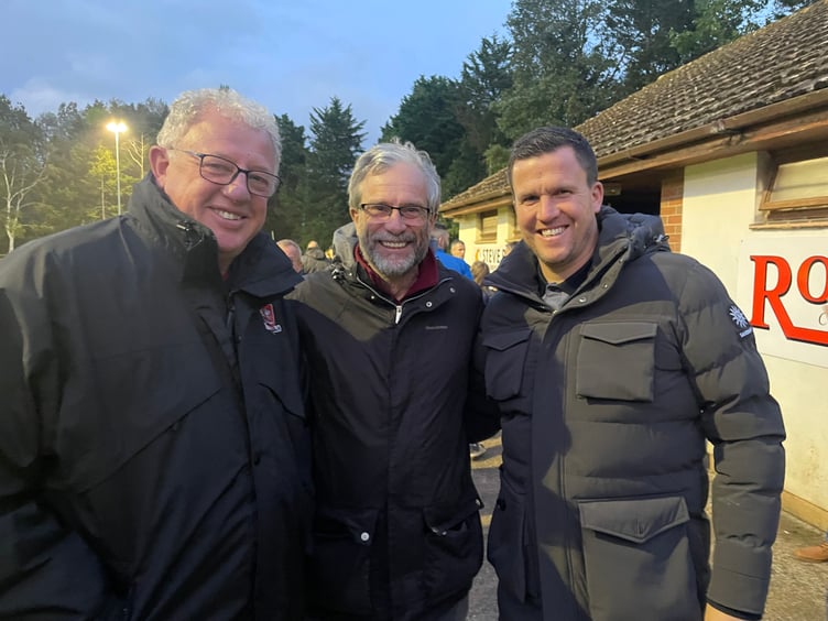 From Exeter City, from left, President Julian Tagg, Martin Weiler and right, Gary Caldwell, First Team manager. AQ 8051