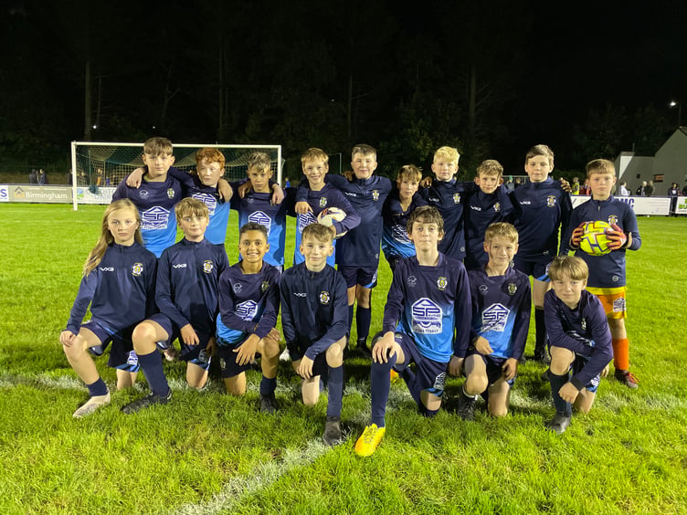 One of the Crediton Youth teams which took part in the half-time kickabout. AQ 8153