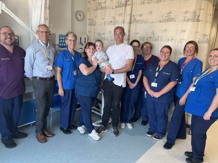 Aedan with his parents and renal and dialysis team at Alder Hey Children’s Hospital