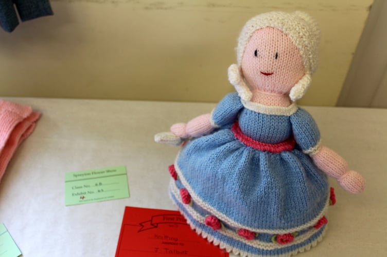 Judith Talbot’s first prize knitted doll. SR 8651