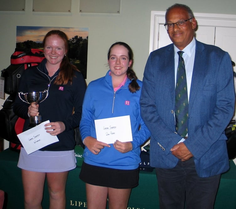 Liphook Scratch Cup winner Annabel Peaford (left) with runner-up Emily Peaford and Liphook captain Siegfried Golding