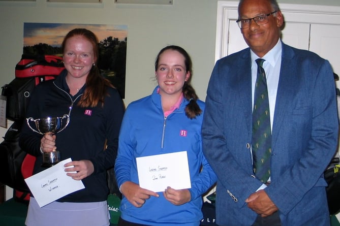 Liphook Scratch Cup winner Annabel Peaford (left) with runner-up Emily Peaford and Liphook captain Siegfried Golding