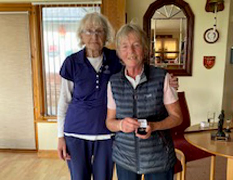Captain Lynda Evans presenting Sue Wilson with the Margaret Jones prize