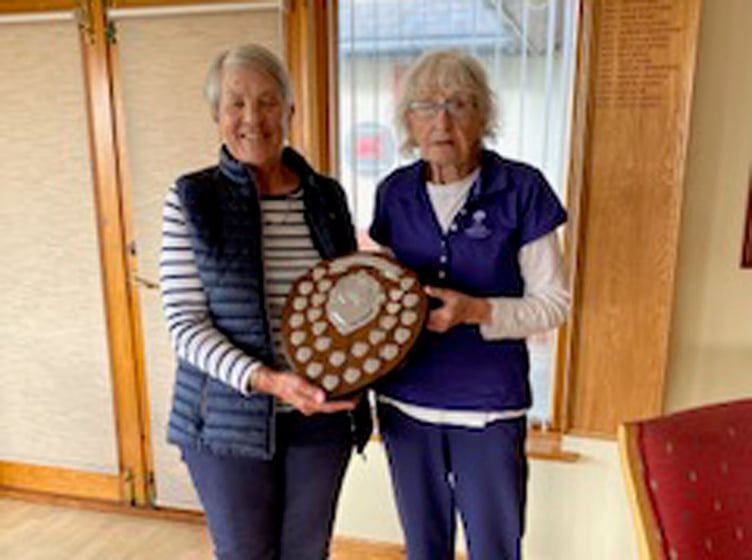 Captain Lynda Evans presenting the Beryl Roberts prize to Barbara Reece