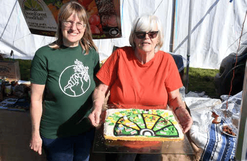 Philippa Swattridge and Judith Williams of the Dean Forest Hub with their 10th
anniversary celebration cake