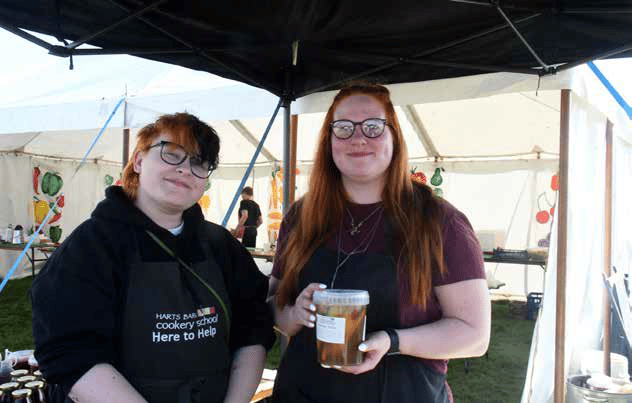 Clare Eckley and Lianna Brain of Harts Barn Cookery School with some pickled chilli