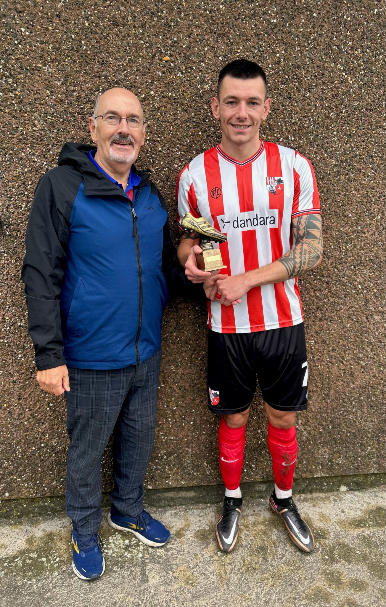 Canada Life Premier League Player of the Month for September, Peel star Lee Gale, is presented with the award by player ratings guru Eric Clague