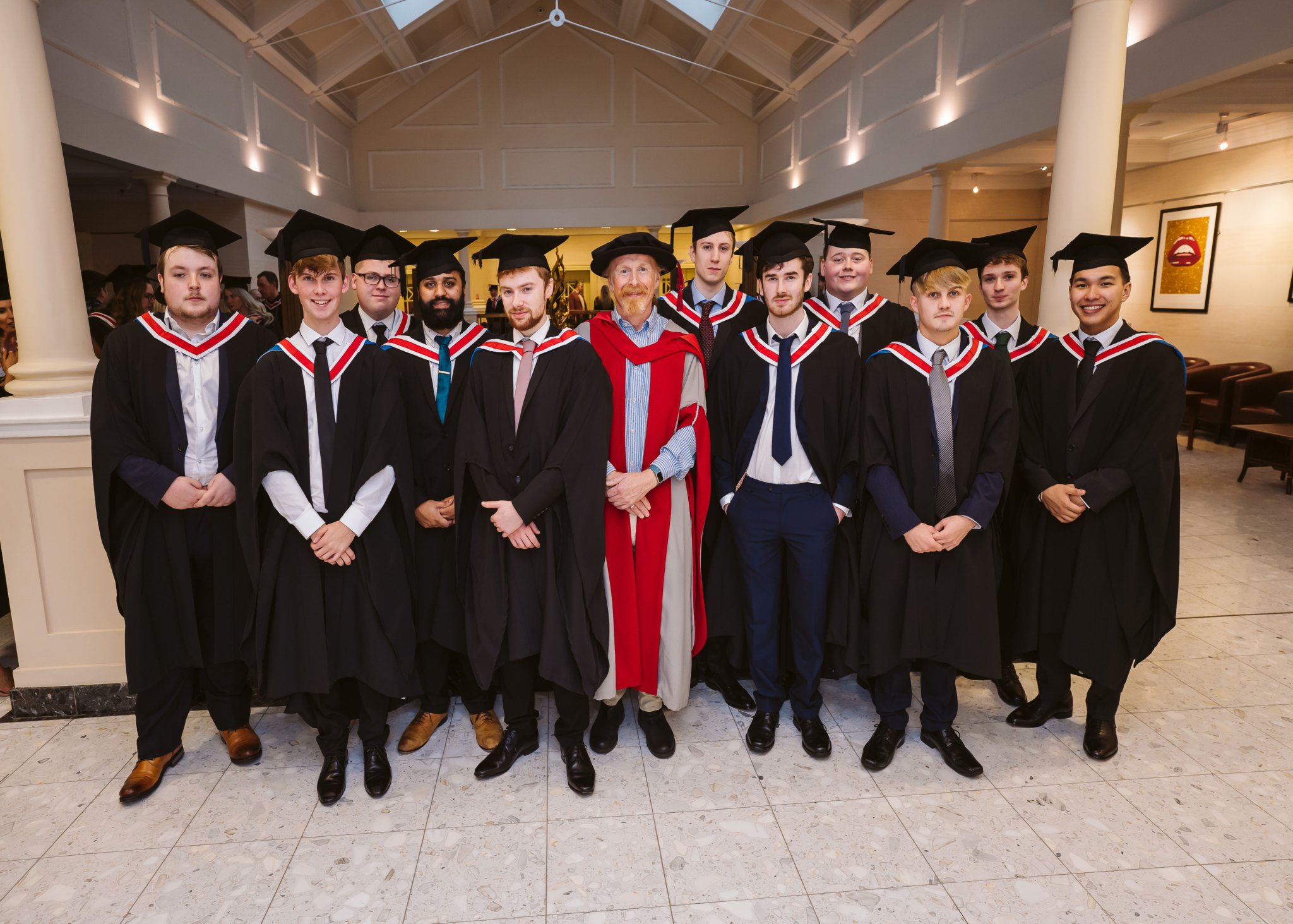 Dr Alistair Robertson, Lecturer in Computer Science with his graduating class.