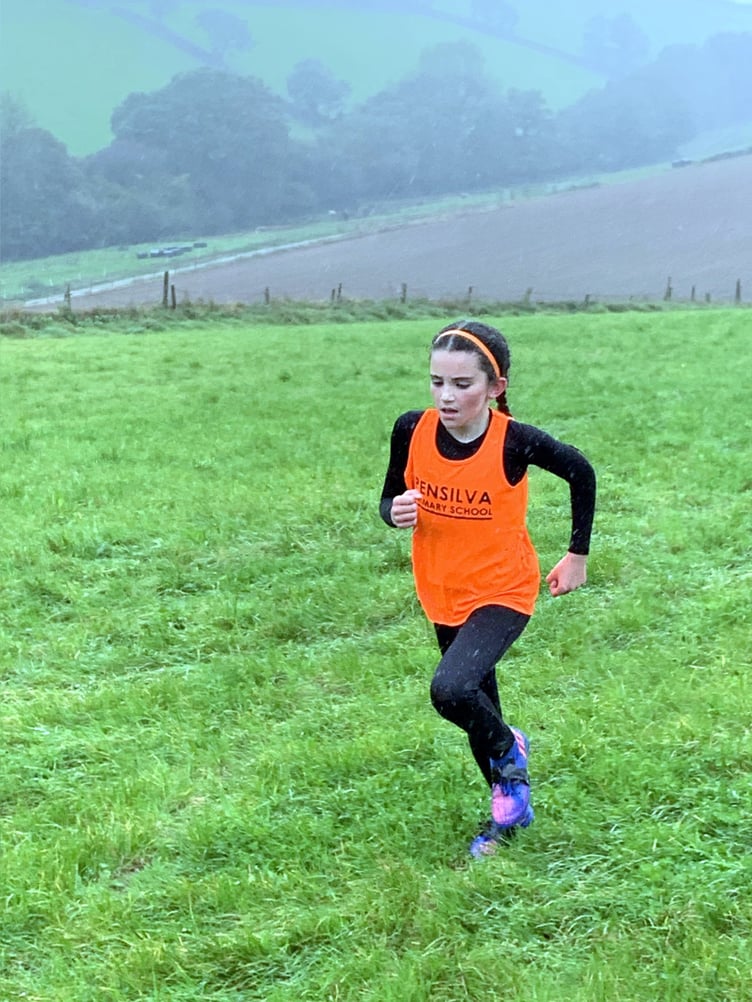 Fiona Kennedy said: “Massive congratulations to Emilia Kennedy - representing Pensilva Primary School. 1st place in the Year 3 and 4 girls in wet horrible conditions. We are so proud of her. Even running alongside one of her peers with another friend, to help finish her own race.”