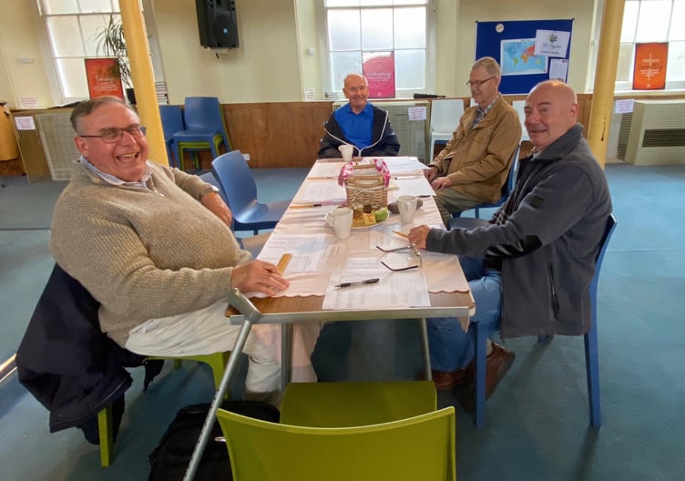 The ‘boys’ table during the charity Coffee Morning. NP 121023 03