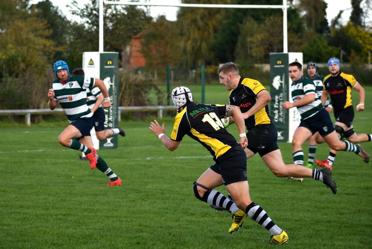Skipper Toby Salmon heads for the Reading line