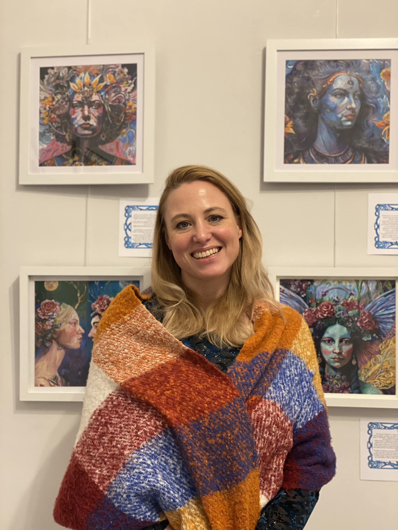 Colette Davies pictured with some of her oil paintings on display at Celtic Goddesses