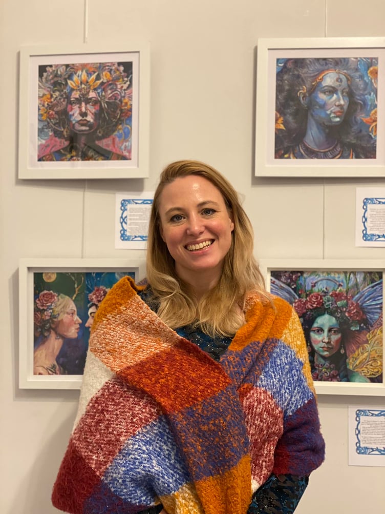 Colette Davies pictured with some of her oil paintings on display at Celtic Goddesses