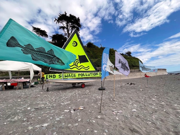 A dirty water protest held on Seaton Beach by Extinction Rebellion and Surfers Against Sewage