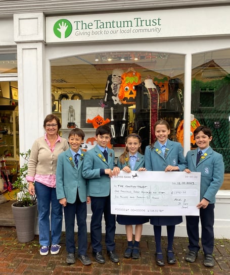 Pupils of St Ives presenting cheque to Tantum Trust