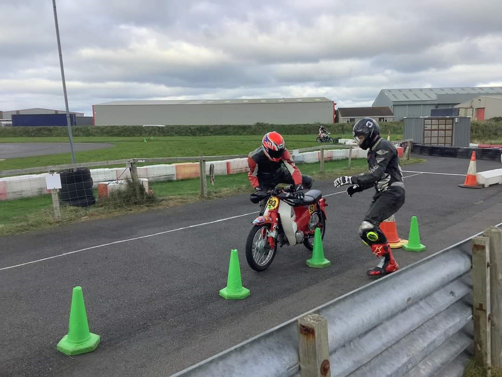 Craig Norrey prepares to take over the controls from Ash Kelly at a change