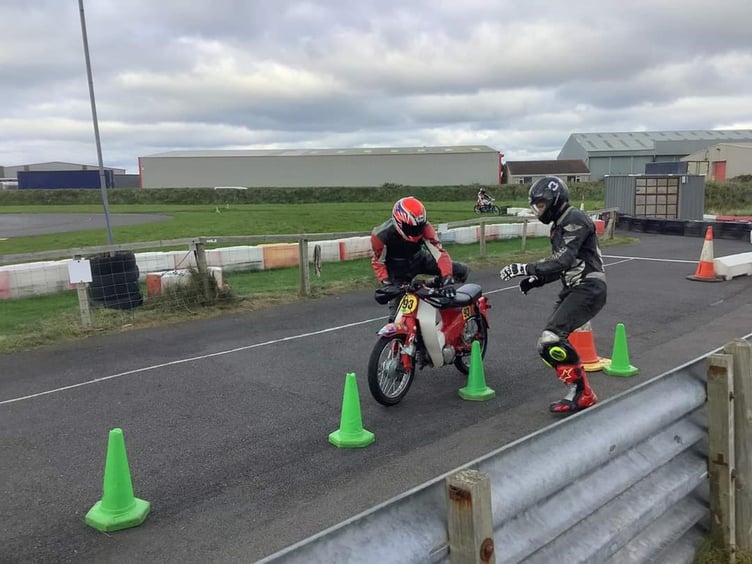 Craig Norrey prepares to take over the controls from Ash Kelly at a change