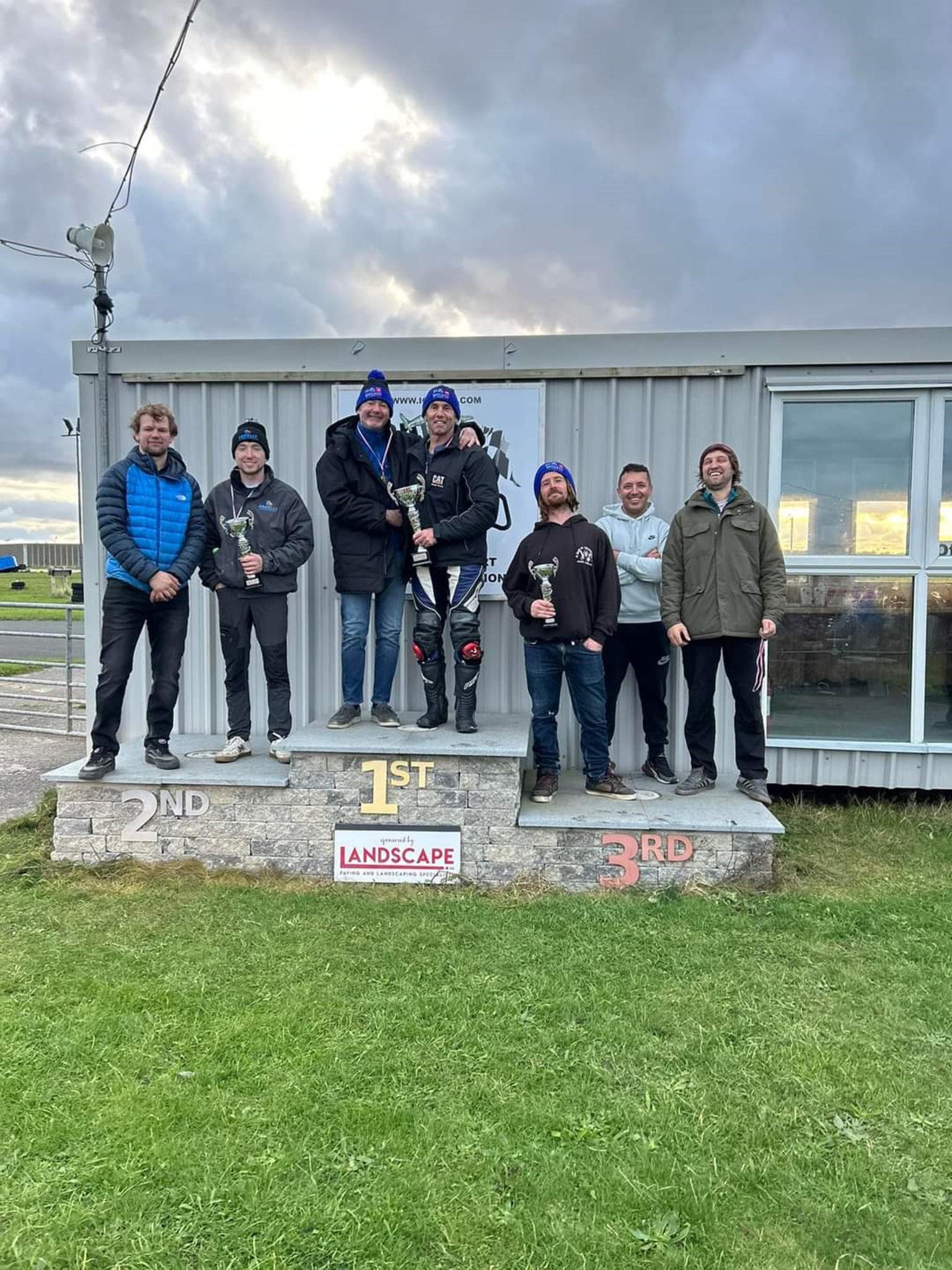 The Jurby MR Sports six-hour Plop Enduro podium on Saturday. Winners Chuck and Wig Bregazzi (centre) flanked by runners-up Craig Norrey and Ash Kelly (left side), and third-placed Tom Dawson, Mark Cringle and Jim Marshall