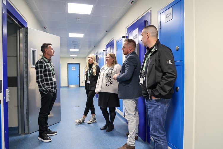 Discussing RESET at Basingstoke custody centre, from left, are Society of St James service manager Paul Mitchell, RESET navigator Lauren Cox, Hampshire and Isle of Wight police and crime commissioner Donna Jones, deputy police and crime commissioner Terry Norton and RESET team leader Russell Loveland, October 25th 2023.
