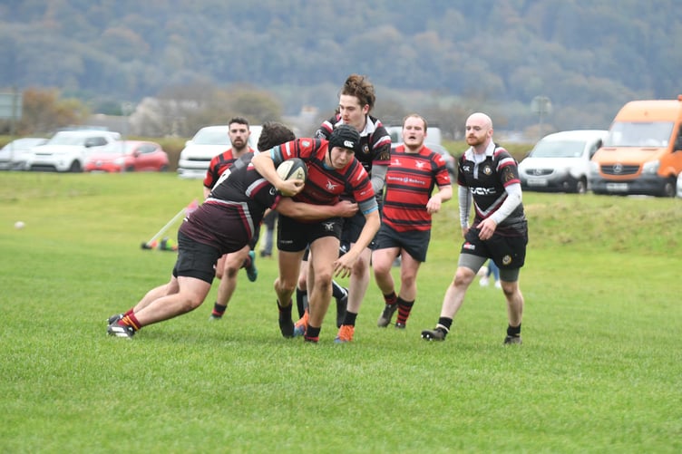 Ramsey captain Josh Corteen in the thick of the action against Western Vikings (DK231028 (79))