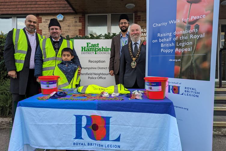 The Ahmadiyya Muslim Elder Association were joined by Cllr Anthony Williams and Cllr Adeel Shah as they launched their fundraising appeal for the Royal British Legion, October 2023.
From left: Luqman Chaudhary, Regional Chair Charity Walk for Peace, AMEA Hampshire and Surrey Areas; Imam Mir Anjum Parvez, Regional President AMEA Hampshire and Surrey Areas; Farhan Chaudhary; Cllr Adeel Shah, Community Development and Engagement Portfolio Holder for EHDC; and Cllr Anthony Williams, Chairman of EHDC.